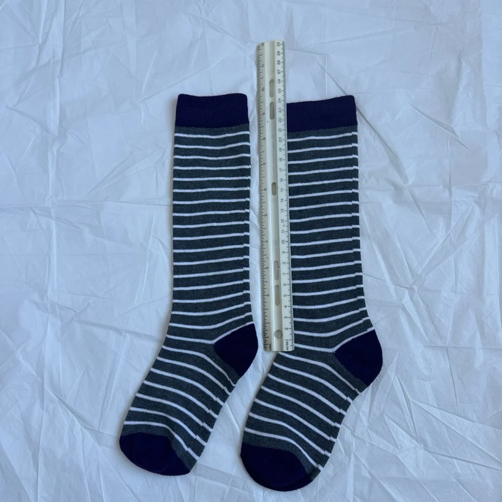 NWOT Striped Grey and White with Purple toe and hill children’s socks;